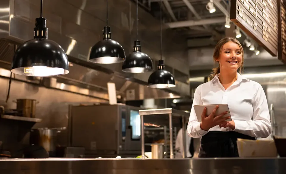 Waitress in restaurant kitchen