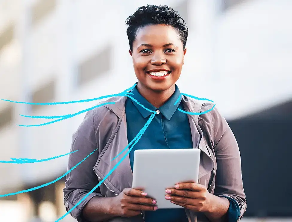 A black woman working on a tablet