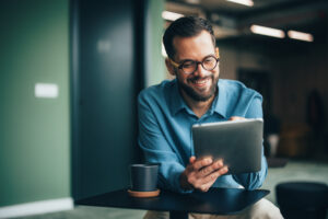 Business person holding tablet