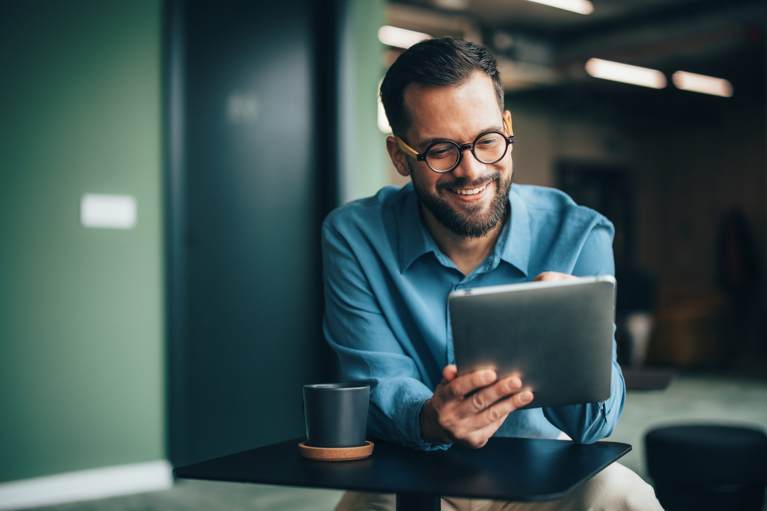 Business person holding tablet